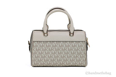 Michael Kors Travel XS Light Cream Signature PVC Duffle Crossbody Handbag